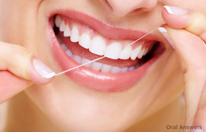 gums_bleeding_when_flossing-700x450